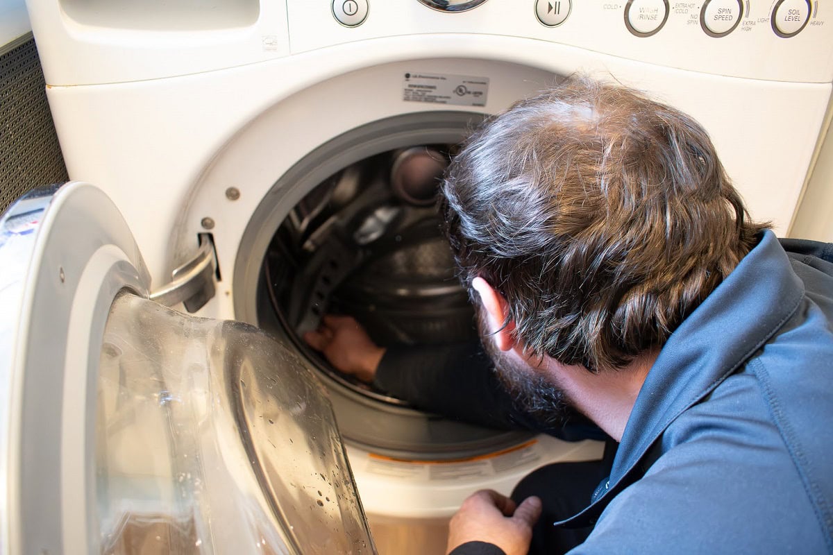 why does my front load washer smell bad