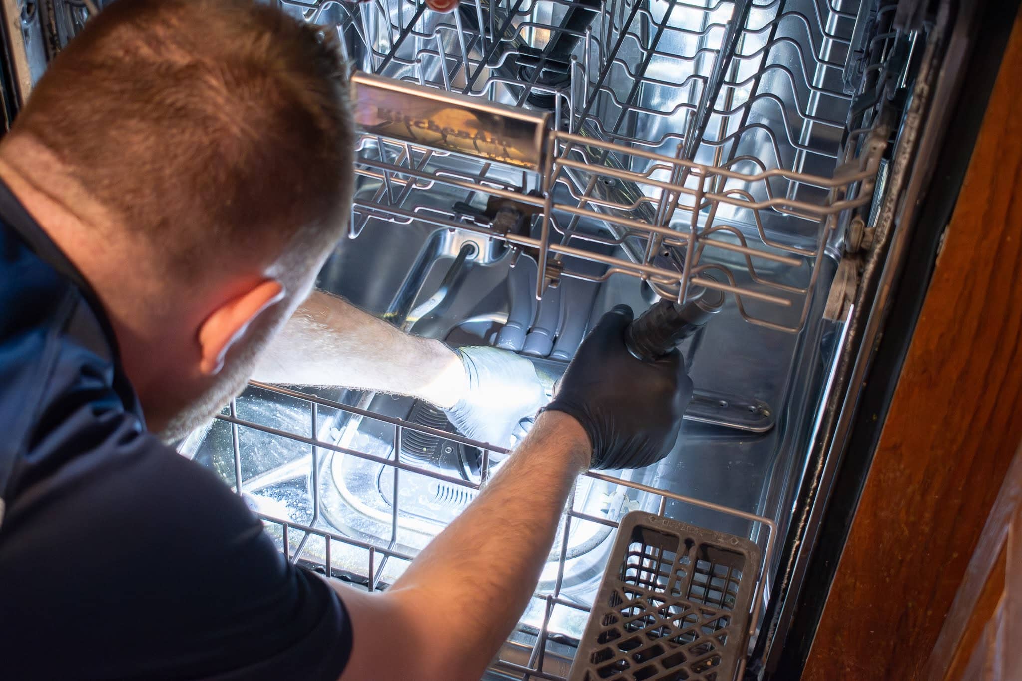Where is the dishwasher filter located